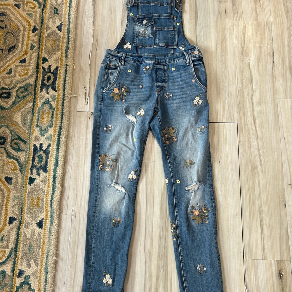 Distressed and embroidered jean overalls